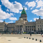 View of El Palacio del Congreso in Buenos Aires from Plaza del Congreso, showcasing its grand architecture.