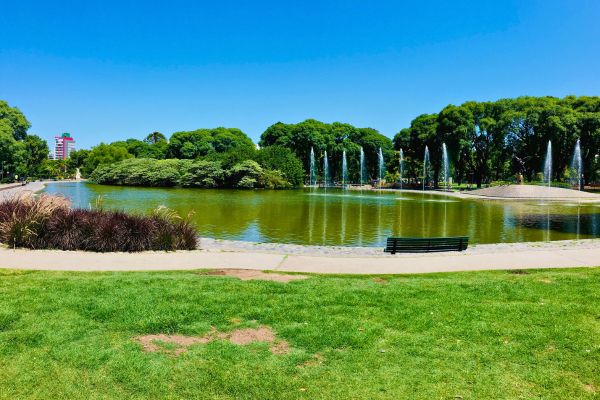 Fountain jets create a beautiful display during summer in the lake at Parque Centenario, located in the Caballito neighborhood of Buenos Aires.