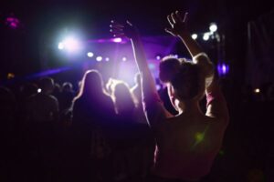 People dancing under disco lights