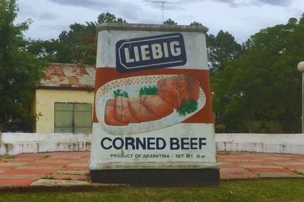 A large tin of Liebig corned beef displayed in the town center of Liebig, Argentina, serving as a monument to the town’s industrial heritage.